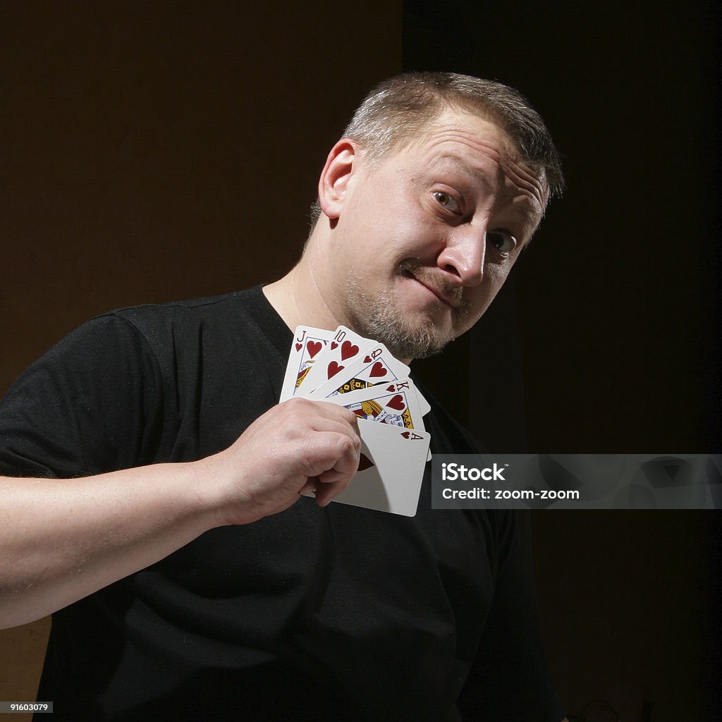 Portrait of the man with royal flush  Adult Stock Photo