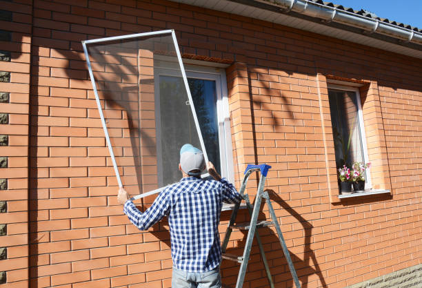 worker install mosquito net or mosquito wire screen on brick house window. - mosquito mosquito netting protection insect imagens e fotografias de stock