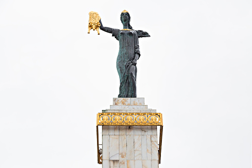 Batumi, Georgia - April 25, 2017: Statue of Medea in Europe Square represents Medea, wife of Jason in greek mythology, holding the Golden Fleece, in Batumi, Georgia.