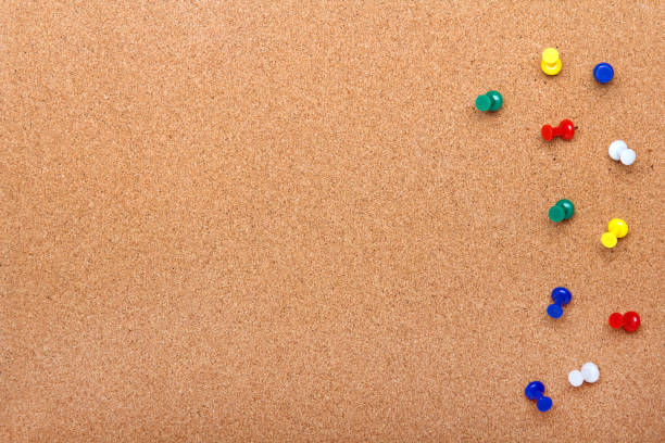 istock Pin board texture for background and colorful pins frame 916044290