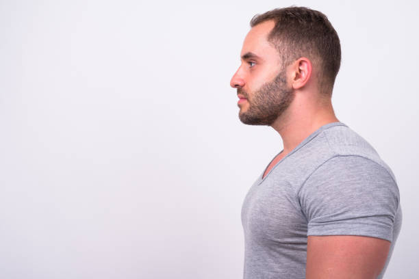istock Portrait Of Man Against White Background 916047170