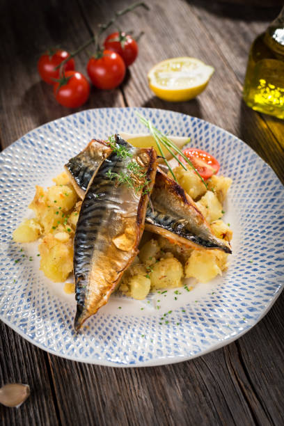 istock Roasted mackerel fillet with potato 916047488