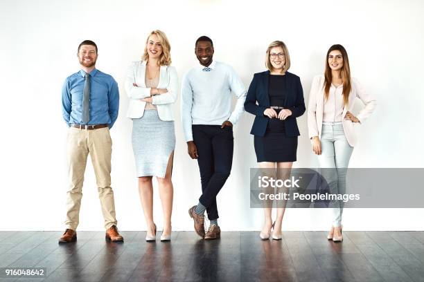 We Call The Shots Stock Photo - Download Image Now - White Background, Employee, Group Of People