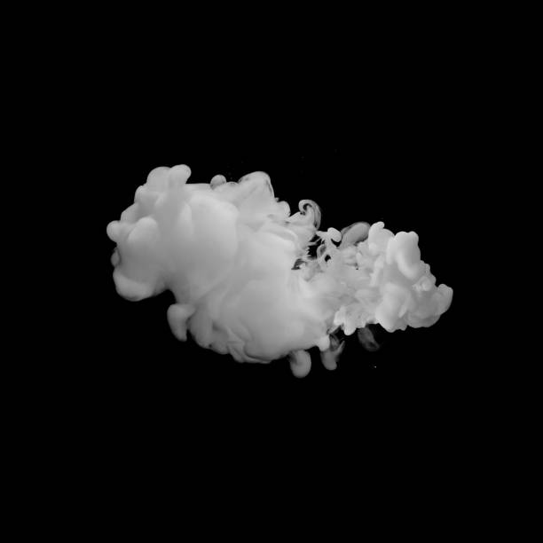 Photo of milk cloud at black background