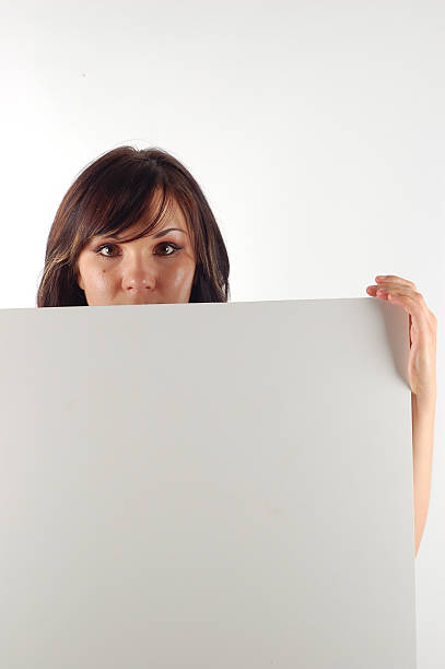 istock woman holding a banner 91605750
