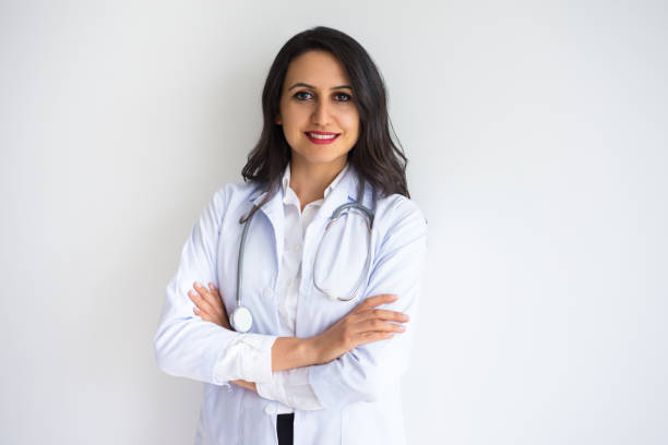 istock Confident Pretty Middle-aged Female Doctor 916057792