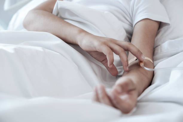 istock Close up of poor child touching injected drop counter 916060266