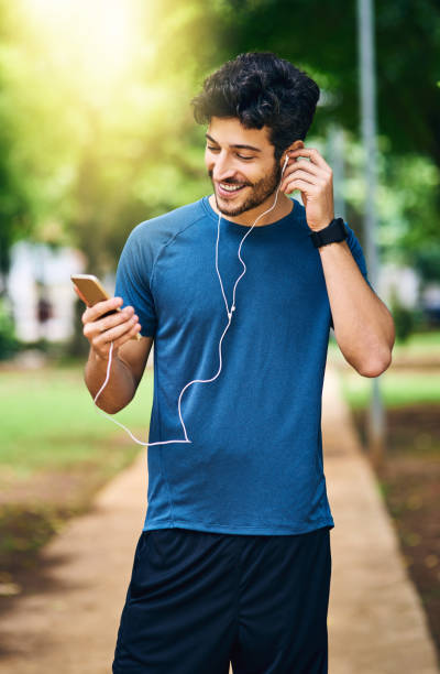 istock Pumping some tunes to push him further 916060480