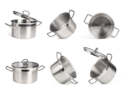 Set of metal saucepans isolated on white background