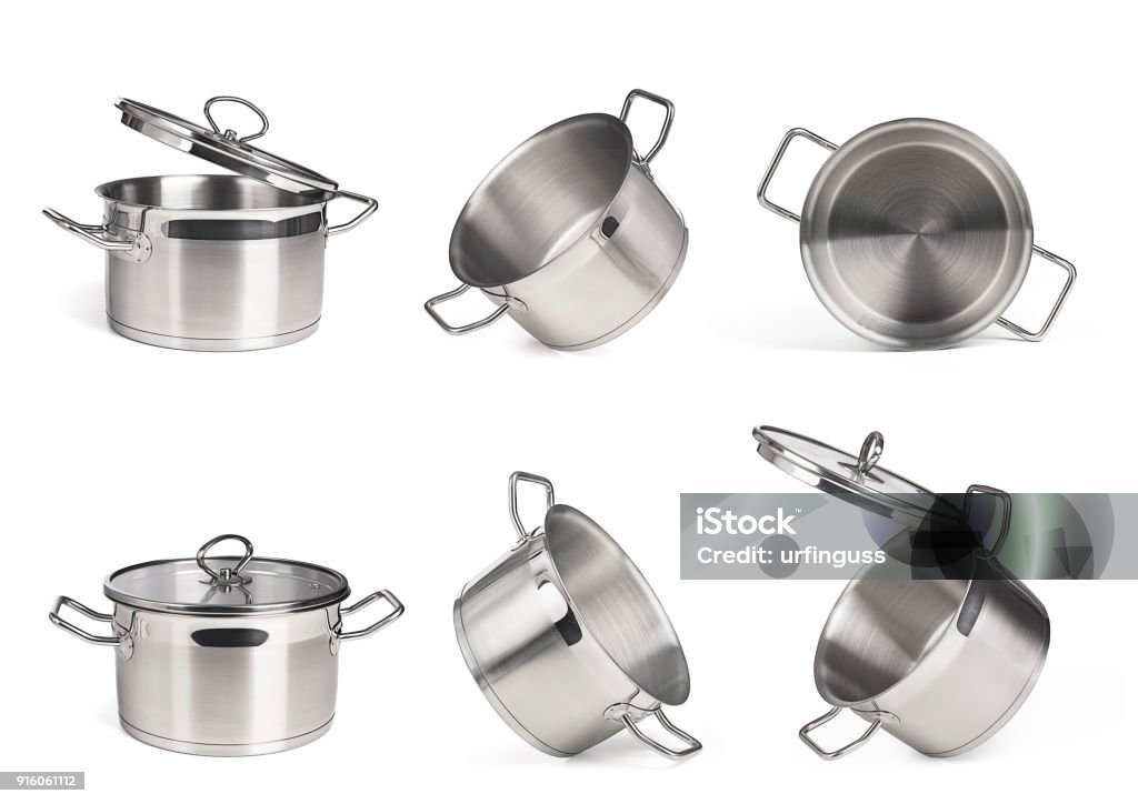 Set of metal saucepans isolated on white background Cooking Pan Stock Photo