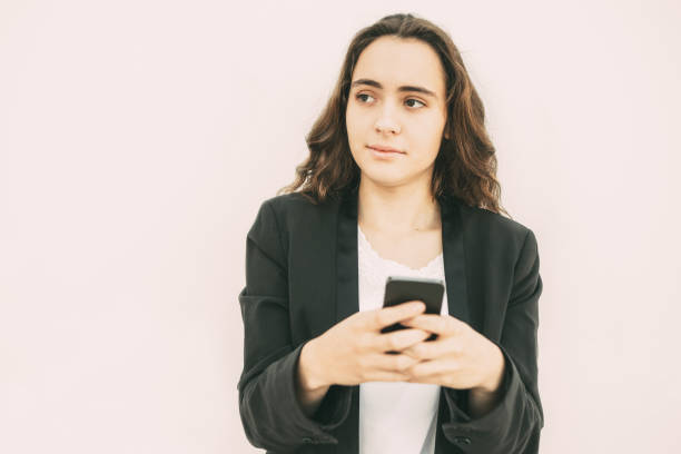 istock Concentrated female manager thinking of message 916064472
