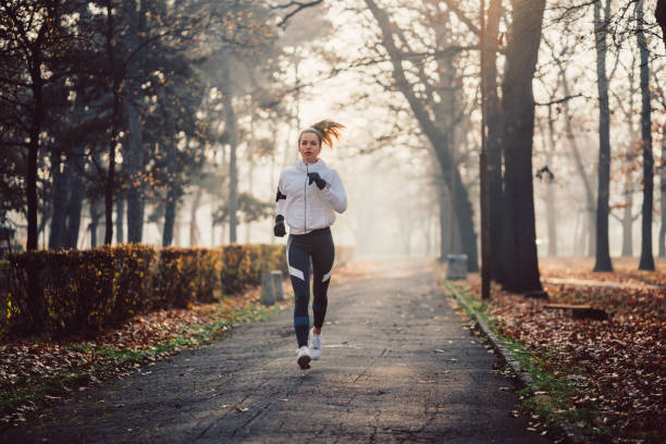istock Woman jogging during winter morning 916068248