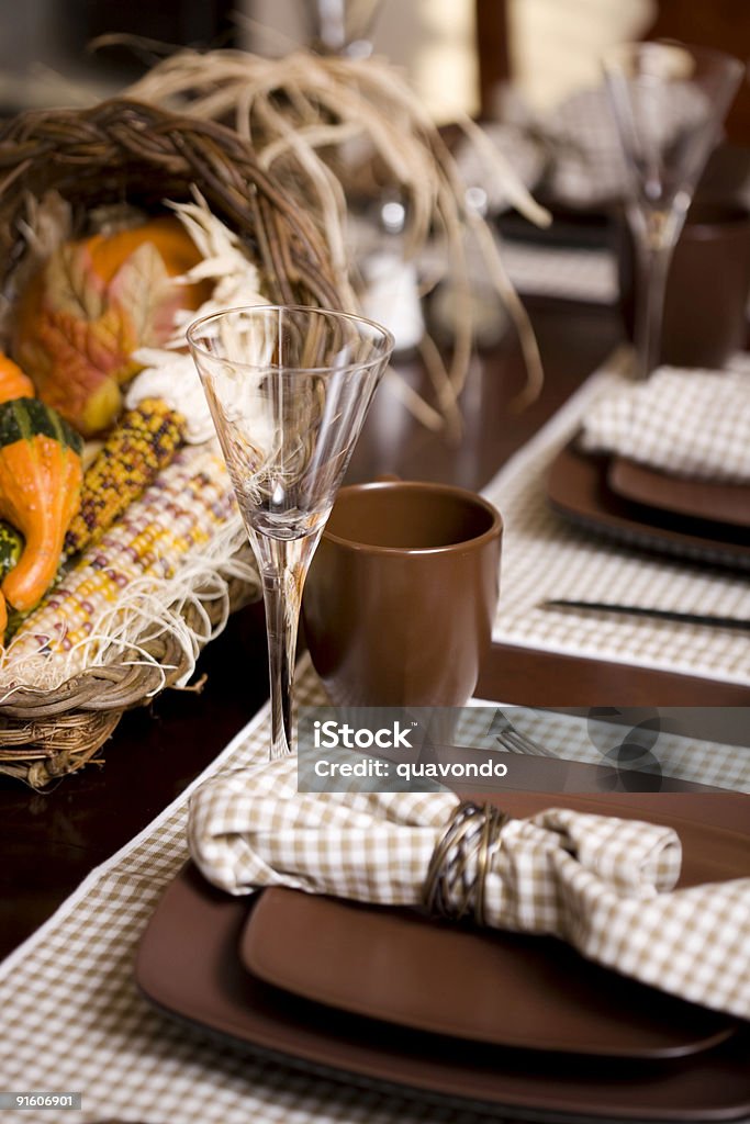 Beautiful Thanksgiving Dining Table Setting with Cornucopia  Autumn Stock Photo