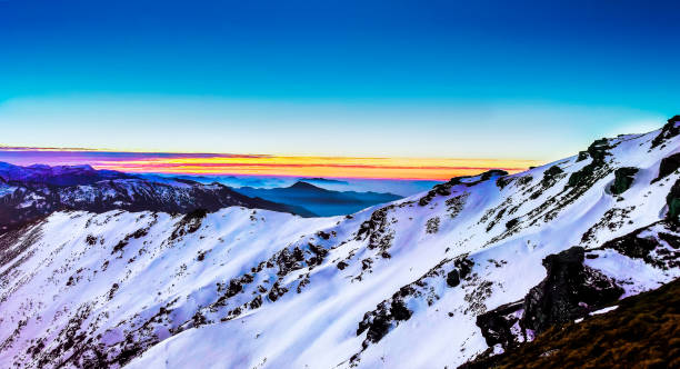 istock Beautiful winter sunrise on a mountain landscape 916071384