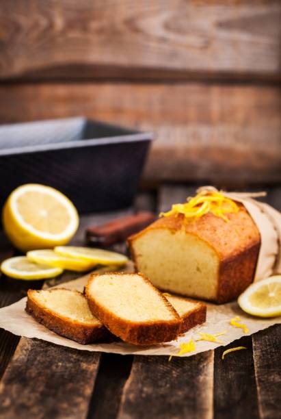 istock Classic lemon pound cake on rustic wooden background 916071644
