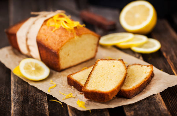 istock Classic lemon pound cake on rustic wooden background 916071672