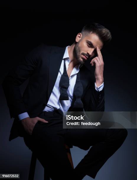 Cool Elegant Man In Tuxedo Having A Headache Stock Photo - Download Image Now - Men, Sensuality, Suit