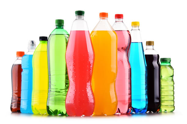 istock Plastic bottles of assorted carbonated soft drinks over white 916072602