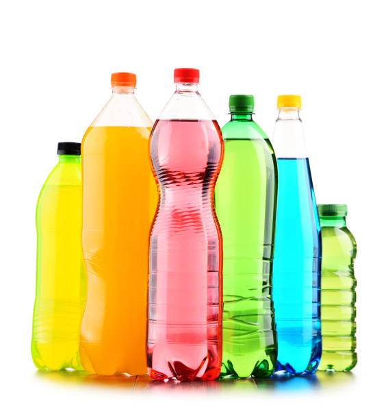 istock Plastic bottles of assorted carbonated soft drinks over white 916075688