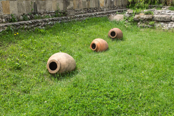 istock Three clay earthenware pots in a row Svetitskhoveli Cathedral, Mtskheta, Georgia, Eastern Europe 916076952