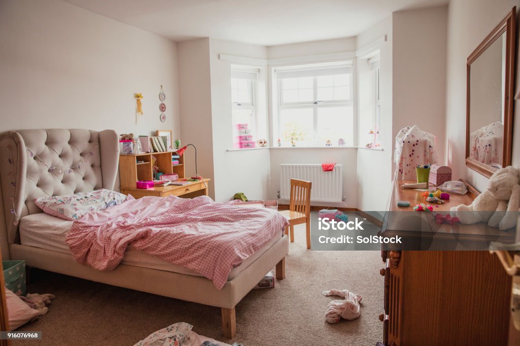 Girl's Bedroom Photograph of a young girl's bedroom. Messy Stock Photo
