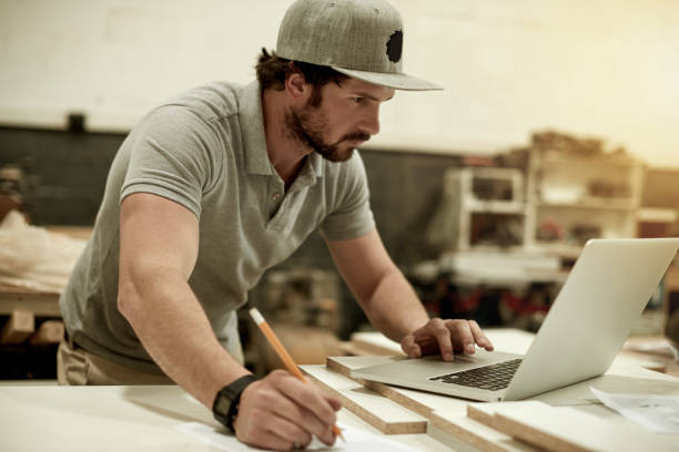 intense concentration - carpenters pencil imagens e fotografias de stock