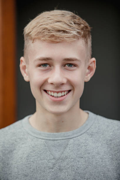 Outdoor headshot of a teenage boy.