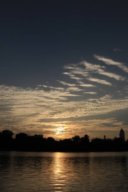 istock beautiful sunset at forest and river 916083820