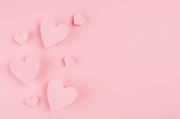 istock Paper hearts soar on pink background, copy space. Valentine. 916084120