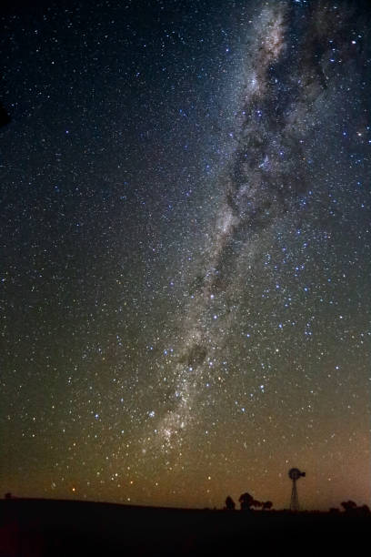 Night sky milky way over rural landscape Beautiful night sky shining brighly with stars milky way galactic core over outback Central West NSW cowra stock pictures, royalty-free photos & images