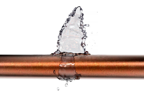 broken pipe is leaking water, isolated on white - burst pipe imagens e fotografias de stock