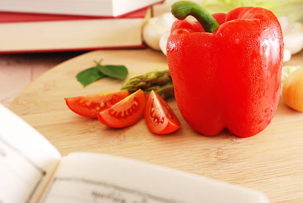 istock cooking book and fresh vegetables on the table 91609722