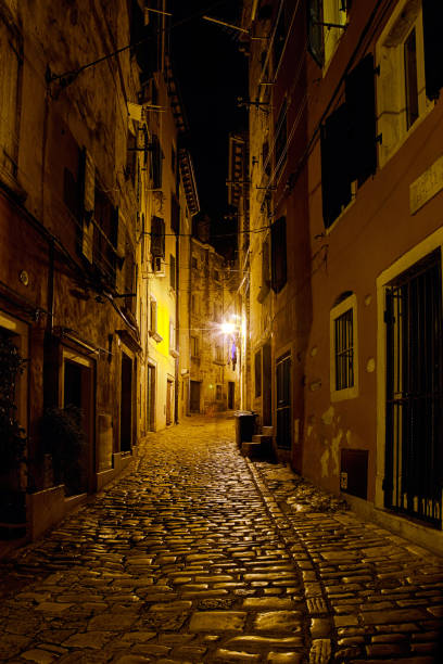istock Old narrow street 916112864