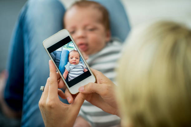 istock Taking A Picture Of Baby 916126472