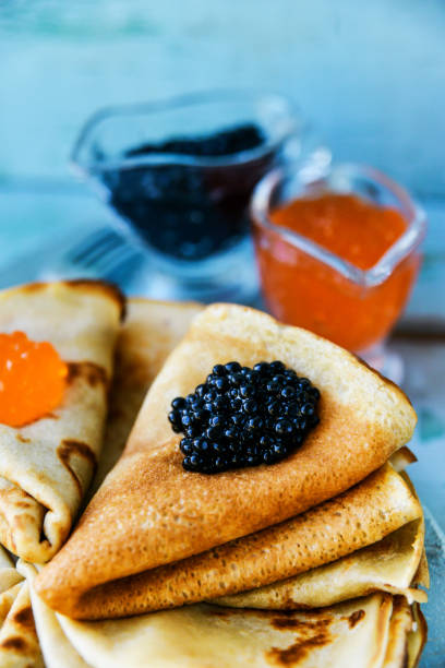 istock Russian Maslenitsa, pancakes with red and black caviar 916134854