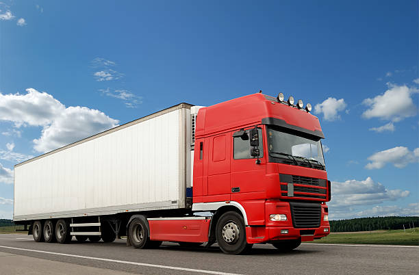 istock Red lorry with white trailer over blue sky 91614017