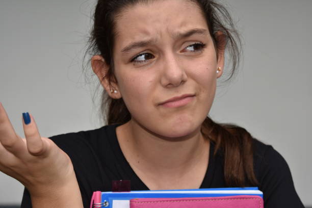 istock Confused Girl Student 916141752