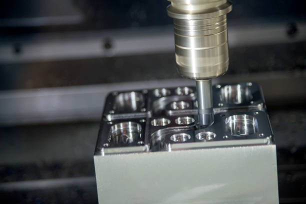 istock The CNC milling machine cutting the sample part. 916144940