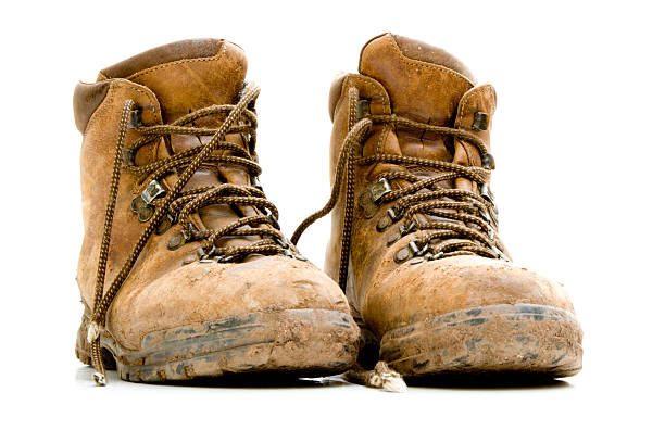 Pair of old worn walking boots stock photo