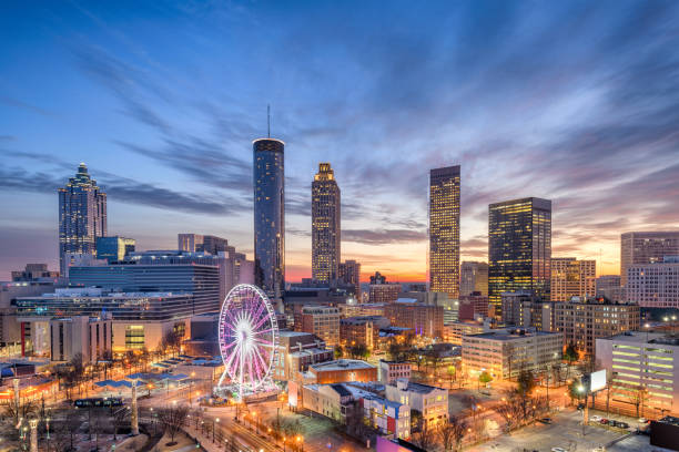 Atlanta, Georgia, USA Atlanta, Georgia, USA downtown city skyline. ferris wheel stock pictures, royalty-free photos & images
