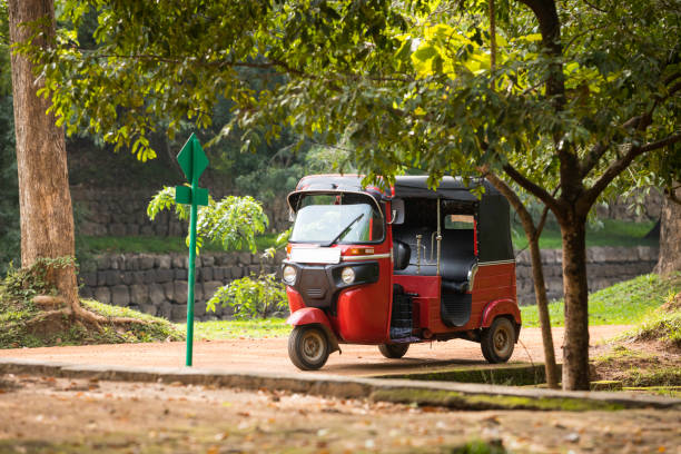 Tuktuk taxi in the Sigiriya park the lavish lower gardens of Sigiriya, located in the Central Province, Sri Lanka taxi sri lanka stock pictures, royalty-free photos & images