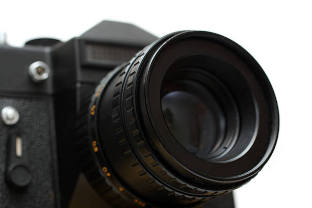istock black slr camera with lens close-up 91615665