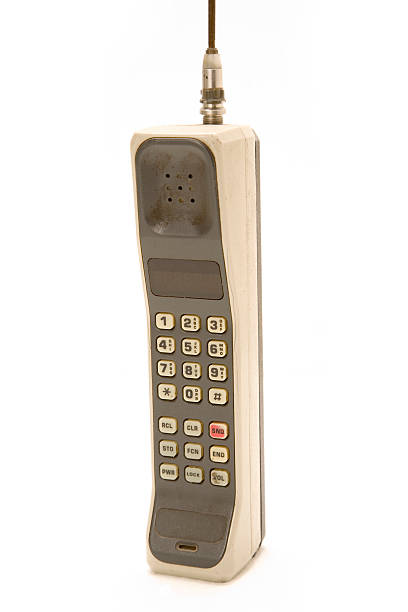 istock Vintage dirty cellphone isolated on white background 91616294