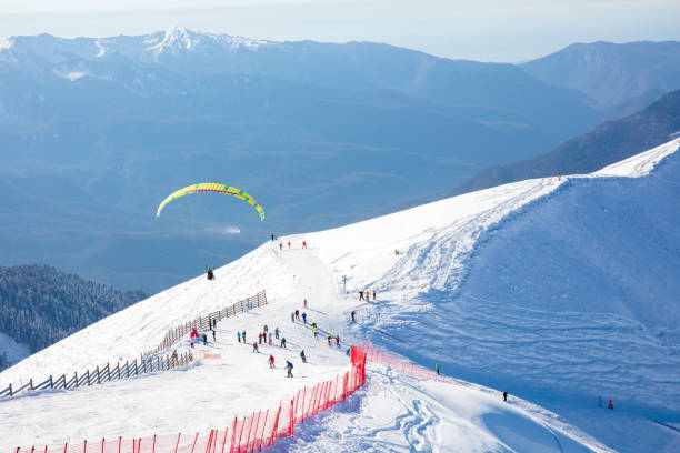 istock paraplane over the ski slope 916164216