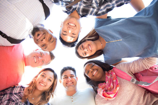 istock College student friends huddle together. 916167106