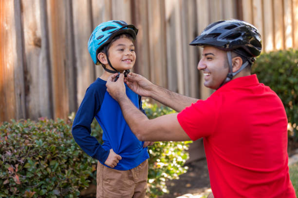 istock Father and Son Sports Safety 916167764