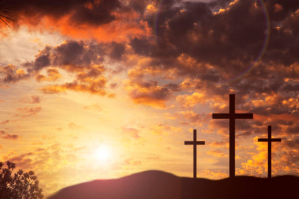 istock Easter, Crucifixion scene with three cross on hill. 916168224