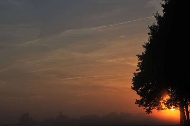 istock Sunrise setting in the ountry 916171052