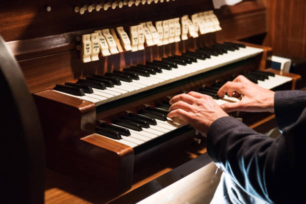 istock Man playing organ, Germany, Europe 916171424