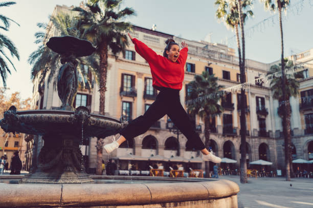 Joyful girl jumping from happiness